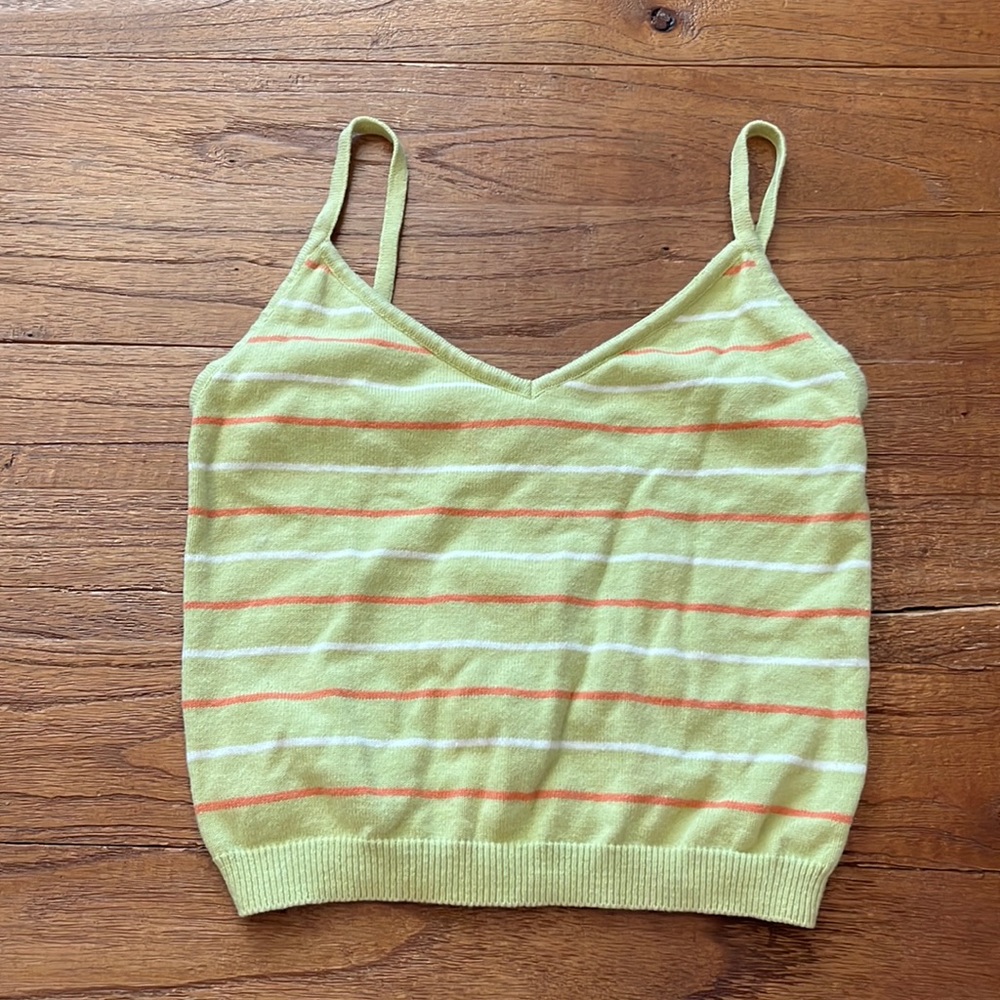 green knit top with orange and white stripes